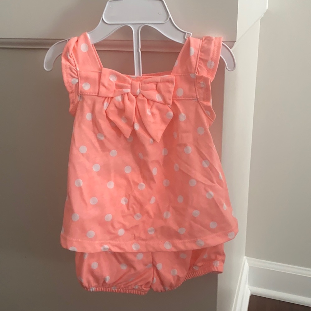 Carter’s 6 month summer set. Never worn but no tags.